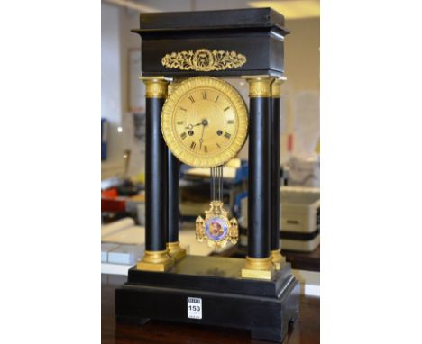 A 19th century French Portico mantle clock, the gilt dial with Roman numerals, flanked by Corinthian style columns, portrait 