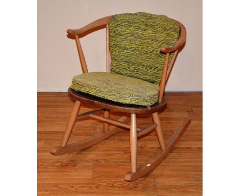 A light Ercol rocking chair, 67cm high x 55cm wide