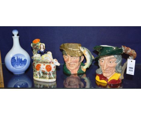 Two large Royal Doulton character jugs, 'The Poacher' D6429 and 'Pied Piper' D6403, 17cm high, together with a Royal Copenhag