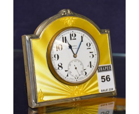 A Walker & Hall silver and yellow guilloche enamel eight day desk clock, hallmarks for Sheffield 1933, 11cm high CONDITION RE