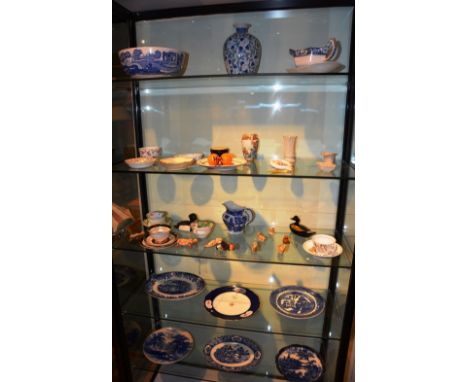 A quantity of blue and white pottery and china, to include Wade Whimsies cups and saucers etc