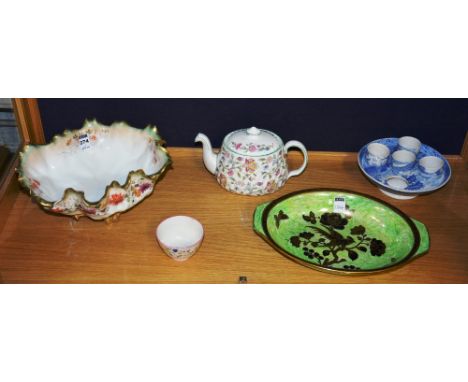 A Moore Bros pottery bowl, 28.5cm diameter, together with a 19th century Spode blue and white egg epergne with four cups, a 1