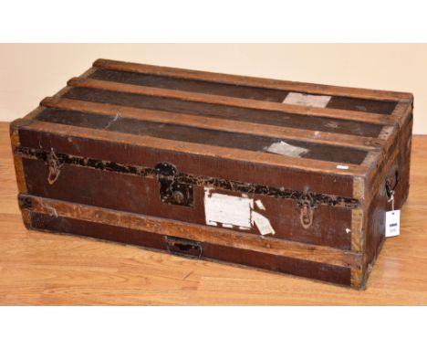 A vintage oak bound travel trunk, 31cm high x 91cm wide