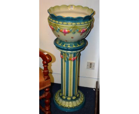 An Art Nouveau style glazed pottery jardiniere on stand, by Wilkinson Ltd, 95cm high (a/f)