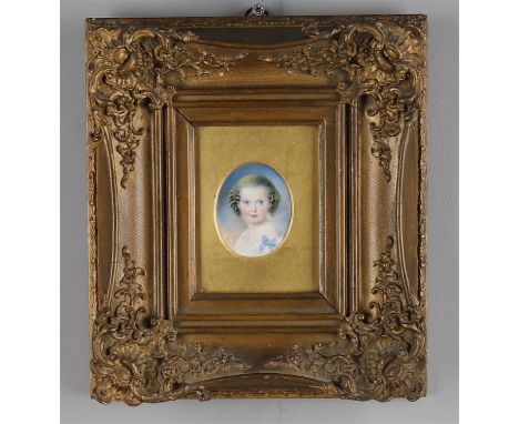 
	
		Y&nbsp;A small oval miniature portrait on ivory of a child, in a gilt gesso frame, 6cms high; and two silhouettes, 19th 