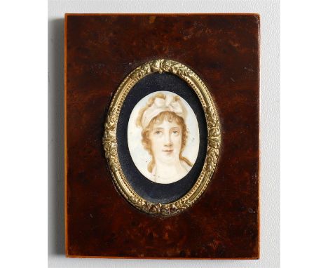 
	
		Y&nbsp;Assorted portrait miniatures including a 19th century miniature on ivory of the head of a young woman, burr wood 