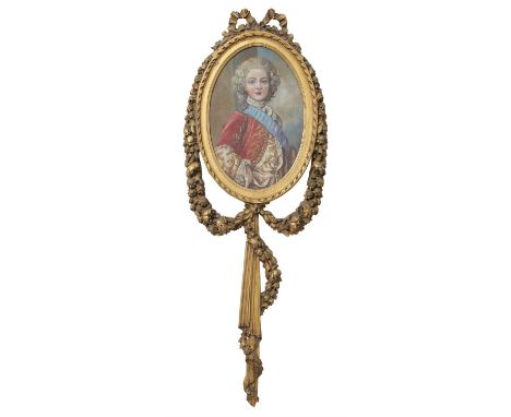 
	
		A carved giltwood picture frame in Louis XVI style, 20th century, surmounted by a ribbon tie and with flower encrusted f