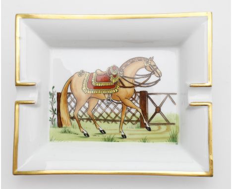 
	
		Hermes- porcelain vide poche or ashtray, decorated with racehorse, gilt detailing, marked "Hermès Paris" in gold, 19cms 