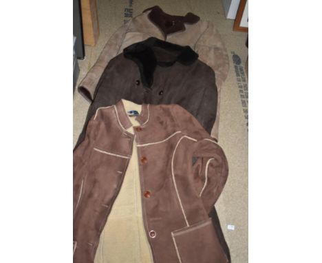Three ladies sheepskin coats including a ladies dark brown double breasted sheepskin coat size 46' chest, a light brown with 