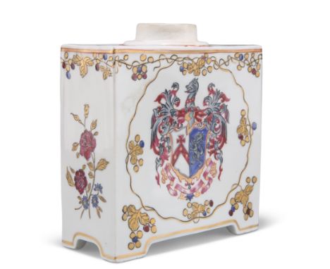 A CHINESE EXPORT-STYLE ARMORIAL TEA CADDY, of rectangular section, enamel painted with a coat of arms and floral sprigs. 15cm