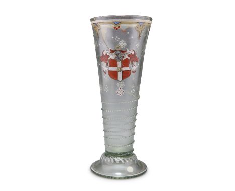 A LARGE CONTINENTAL BEAKER (OR VASE), the tapering body enamel painted with an armorial and with applied trailed glass, raise