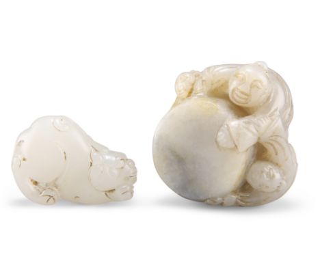 TWO CHINESE JADE CARVINGS,&nbsp;including&nbsp;A GROUP OF THREE FIGURES PLAYING A DRUM, 3cm by 5.5cm by 6cm; and&nbsp;A LUDUA