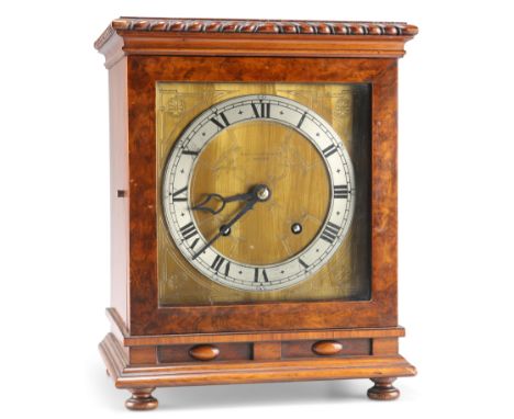 AN EARLY 20TH CENTURY WALNUT MANTEL CLOCK, SIGNED MANOAH RHODES &amp; SONS LTD, BRADFORD, with two-train movement striking th
