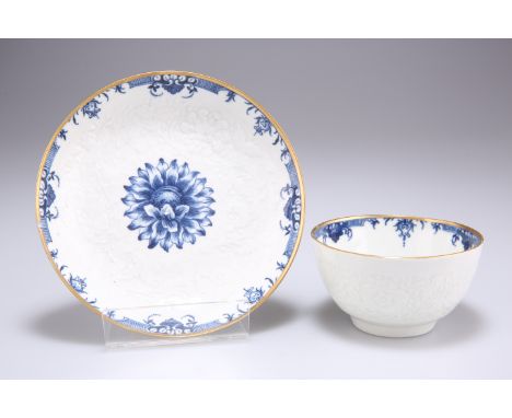 A WORCESTER BLUE AND WHITE TEA BOWL AND SAUCER, CIRCA 1765-70,&nbsp;decorated with the 'Chrysanthemum' pattern, moulded groun