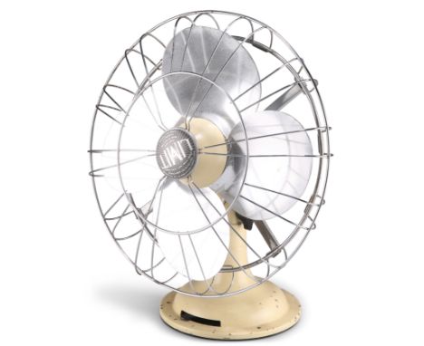 A MID 20TH CENTURY LIMIT INDUSTRIAL ELECTRIC DESK FAN, in cream enamel, with chrome blades and steel cage. 32cm high