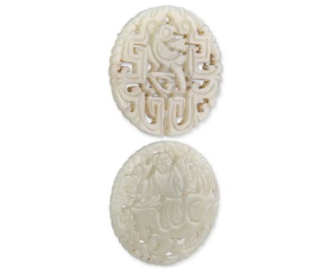 TWO CHINESE CARVED AND PIERCED JADE PENDANT PLAQUES, one depicting a man riding a qilin, 5cm diameter; the other a bird withi