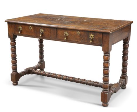 AN 18TH CENTURY-STYLE OAK SIDE TABLE, with moulded rectangular top and a pair of frieze drawers with brass pear-drop handles,