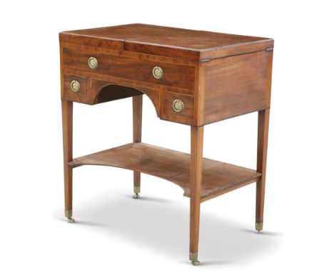 A SHERATON PERIOD MAHOGANY DRESSING TABLE, with twin hinged top and rising mirror to a fitted interior, raised on tapering sq