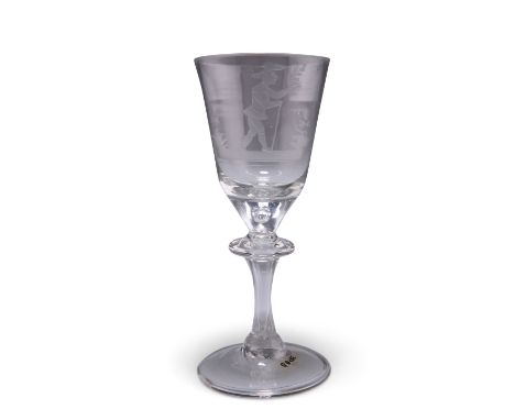 AN ETCHED WINE GLASS, CIRCA 1775, the conical bowl decorated with a figure holding flowers in one hand and a stick in the oth