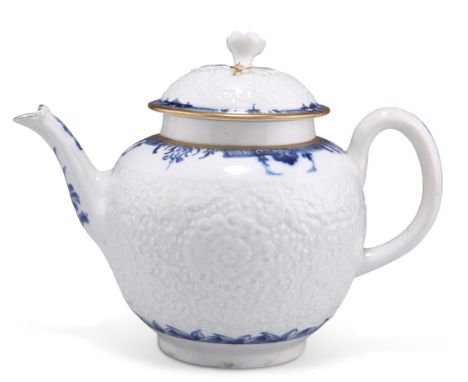 A WORCESTER BLUE AND WHITE TEAPOT AND COVER, CIRCA 1765-70, decorated with the 'Chrysanthemum' pattern, moulded ground, label