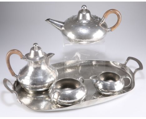 A PEWTER FIVE-PIECE TEA SERVICE, by W&amp;Co Homeland, comprising a teapot, hot water jug, milk jug, sugar bowl and two-handl