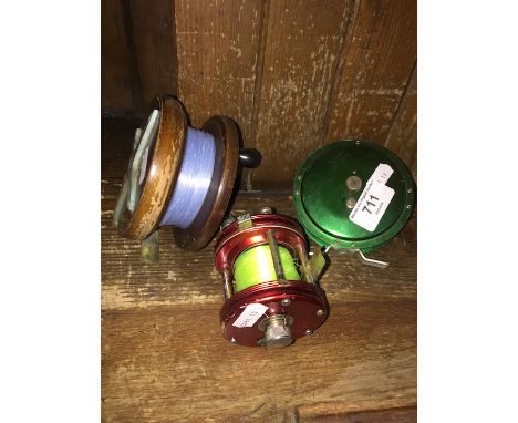 Three vintage fishing reels.  