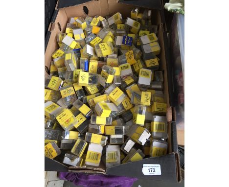 A box of vintage car fuses and screws  