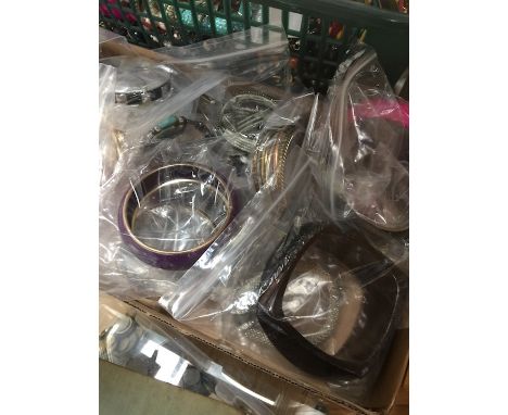 A box of vintage and modern bracelets  