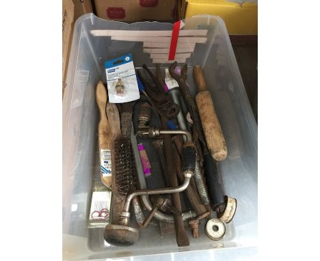 A box of assorted tools to include chisels  