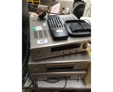 A Denon mini hi-fi system with remote - AM-FM stereo receiver, CD player and cassette player  No speakers