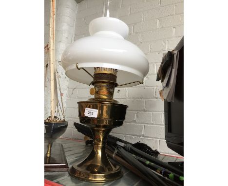 A Aladdin 23 parafin lamp with milk glass shade and glass chimney  