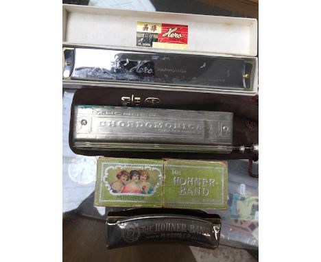 3 vintage harmonicas  