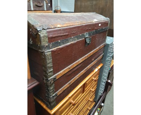 A vintage domed travel trunk  