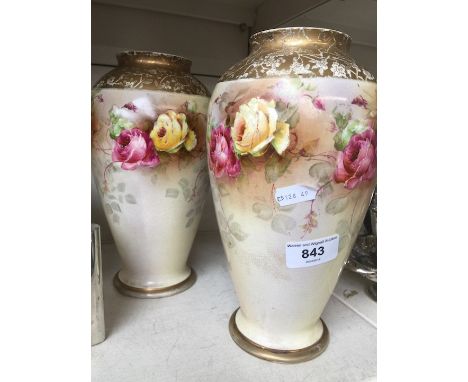 Pair of vintage floral vasesCondition: One vase with damage/restoration to base and cracks to top rim, crazing and loss to de