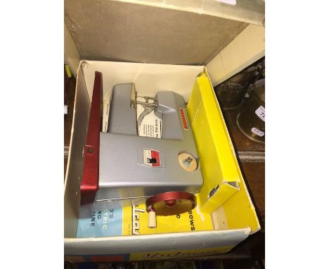 A vintage Vulcan Classic child's electric sewing machine.  