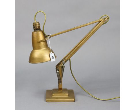 A vintage Herbert Terry &amp; Son’s of Redditch anglepoise desk lamp with gold finish.