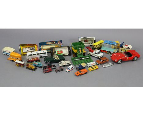 Three Dinky scale model cars “Corvette Stingray”, “Ferrari P5”, &amp; “Mclaren M8A can AM”, all boxed; together with approxim