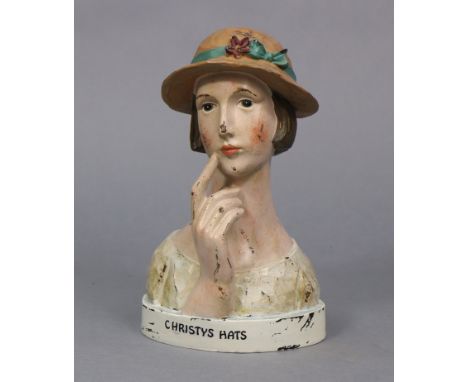 A painted composition shop’s display model “Christy’s Hats” 11½” high.