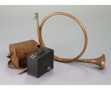 A copper &amp; brass hunting horn, 22” long; &amp; a Kodak Brownie “No. 2A” box camera, with case.
