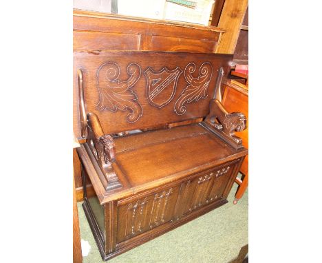 20thC Monks Bench with Lion handles and panel front