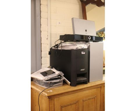 Bose Surround speaker set and a part Loewe Speaker system 