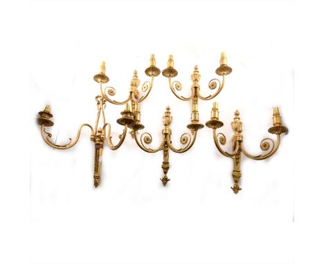 Four modern gilt metal two-light wall brackets, reeded and scrolled branches, 36cm; and another. (Qty: 5)
