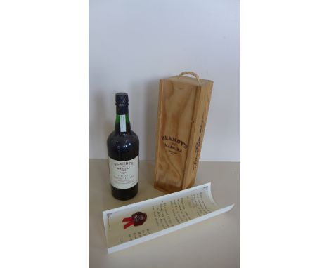 A 75cl Bottle of Blandy's vintage Terrandez 1960 Madeira wine with certificate dated 19/09/02 and box ,level as images. No le