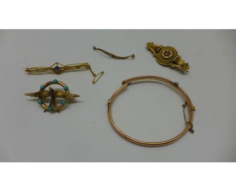 A 15ct yellow gold brooch approx 3.3gs missing one pearl, a broken 9ct bangle approx 4.5gs, a 9ct gold mourning brooch, a gil