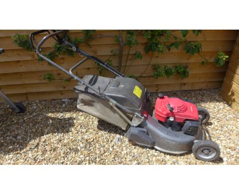 A Honda Pro Roller petrol lawnmower in running order. 