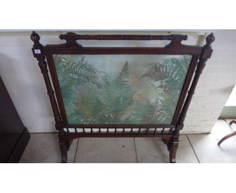 An Edwardian mahogany firescreen 116 cm high, 107 cm wide 