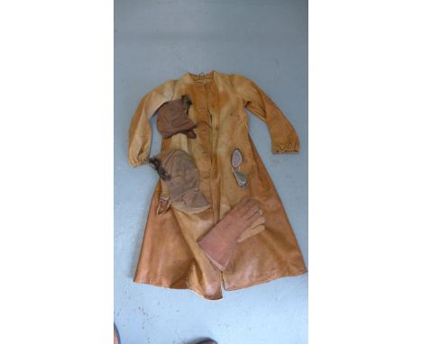 A soft light tan leather flying coat, 2 leather flying helmets, a pair of goggles and gauntlets. All have some wear 