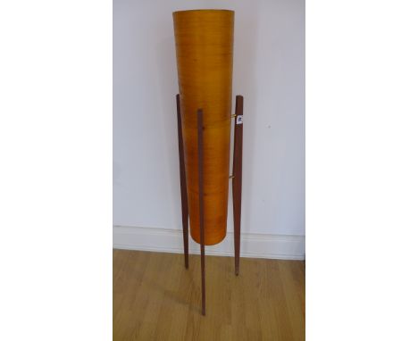 A 1970s Rocket Floor lamp with cylindrical fibreglass shade raised on a teak triform stand. 113cm tall.Slight wear to shade, 