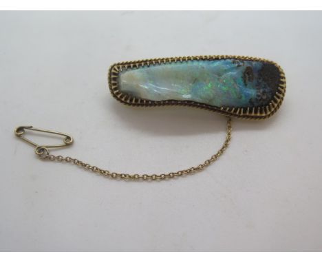 A 15ct yellow gold set Opal brooch - 35mm long marked 15ct in good condition 