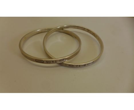 A Tiffany &amp; Co 1887 entwined interlocking silver double bangle 6.7cm exterior width, approx 39.4 grams - generally good -